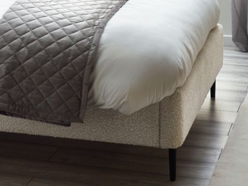 Eden Ivory Boucle Fabric Bed Legs Close-Up