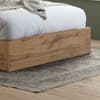 Halfden White Boucle Fabric Winged Wooden Ottoman Bed