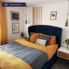 Warwick Blue Velvet Fabric Winged Ottoman Bed