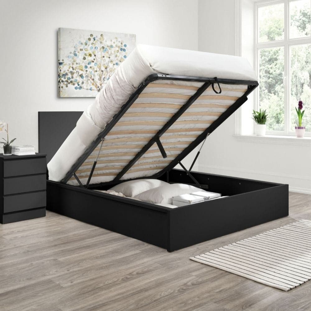 Black bed with shop drawers