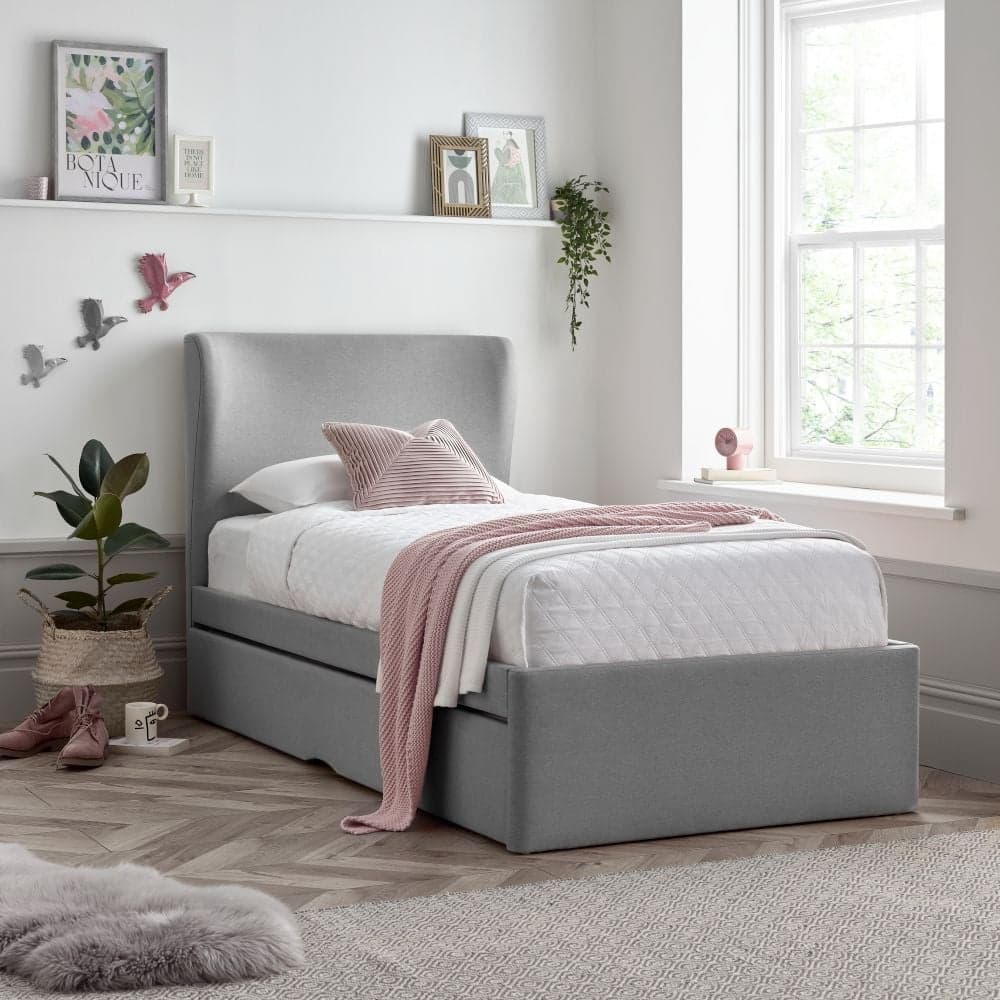 Grey full size store bed with trundle