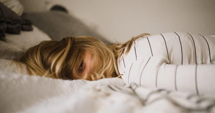 Girl Laying On Bed