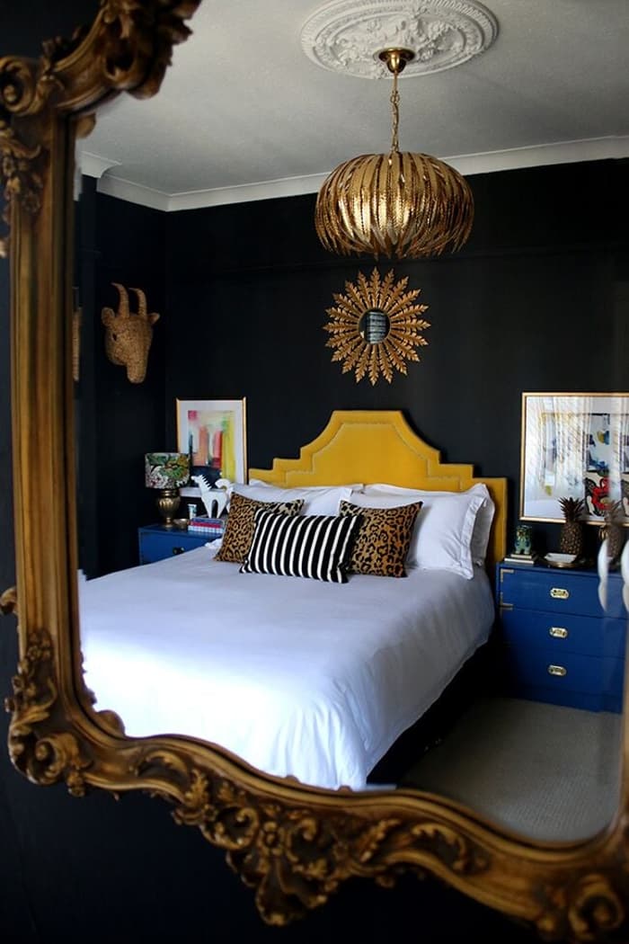 Black Wall And Yellow Bed