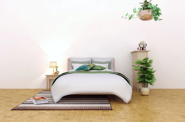 Spacious bedroom with white bed and plants