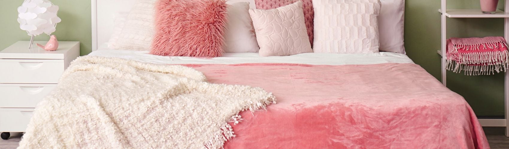 Layered fabrics on a bed