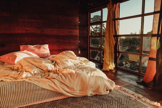 Autumnal bedroom with glass windows