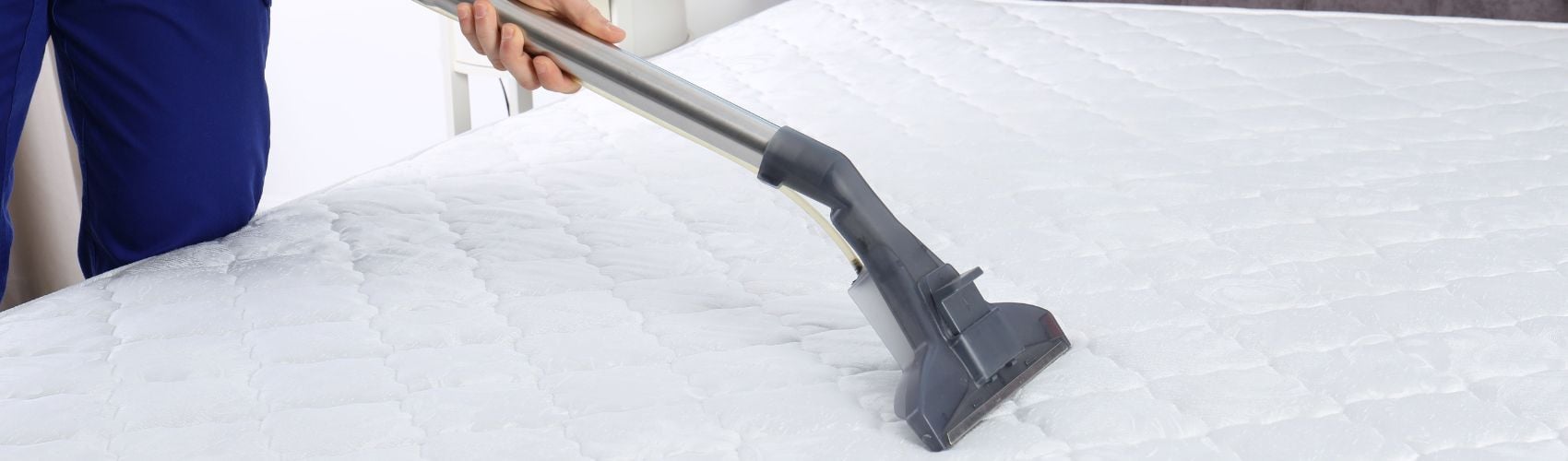 Vacuuming a mattress