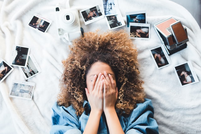 Woman with polaroid images